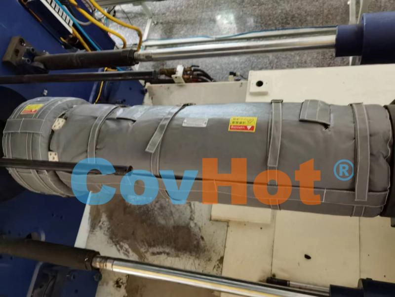 為注塑機節(jié)能“穿衣”，每年省下可觀電費——可拆卸保溫套的經(jīng)濟賬